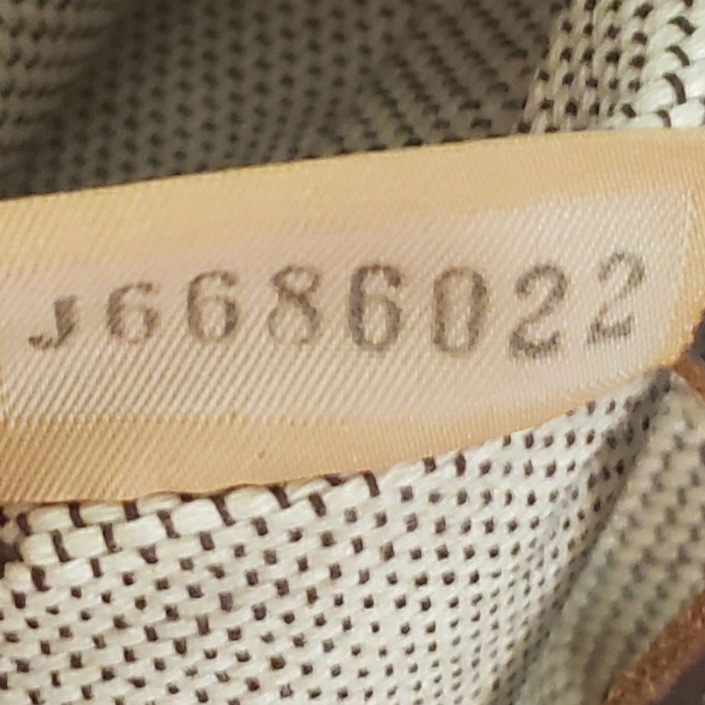 Dooney and Bourke Pebbled Leather Hobo Handbag - Picture 13 of 16